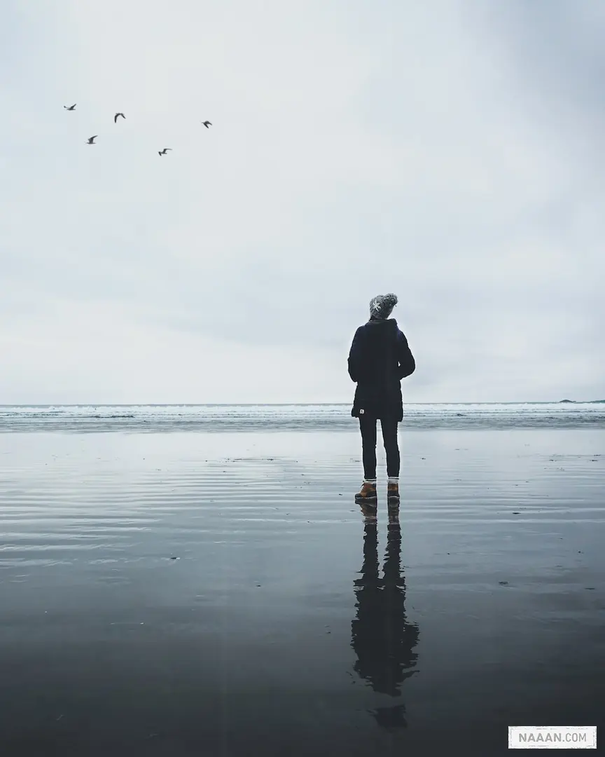 person standing on body of water